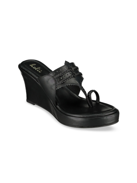 

Holii Women Black Solid Heeled Boots