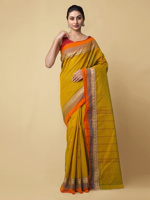 

Unnati Silks Green Pure Cotton Solid Chettinad Saree