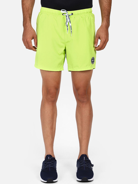

hummel Men Green Solid Regular Fit Sports Shorts