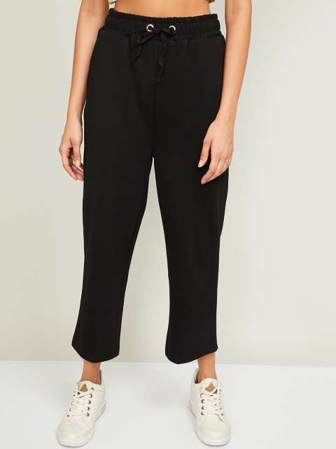 

Ginger by Lifestyle Women Black Regular Fit Solid Parallel Trousers