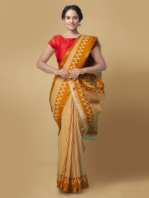 

Unnati Silks Women Yellow & White Pure Batik Printed Cotton Sustainable Saree