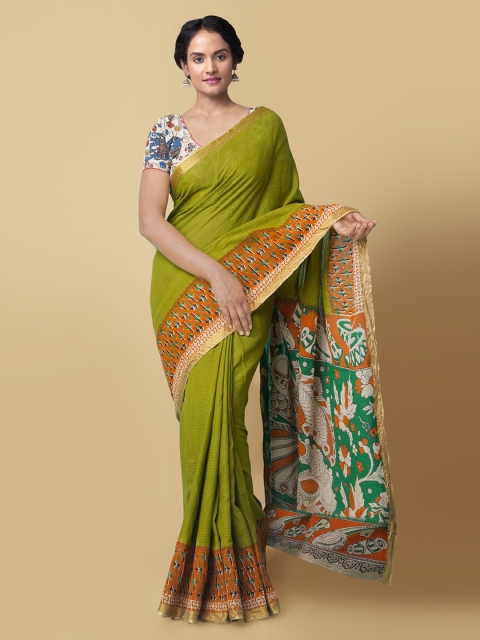 

Unnati Silks Green Pure Cotton Solid Kanjeevaram Saree
