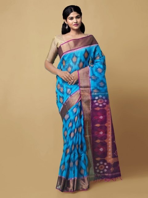 

Unnati Silks Blue & Magenta Cotton Blend Woven Design Ikat Saree
