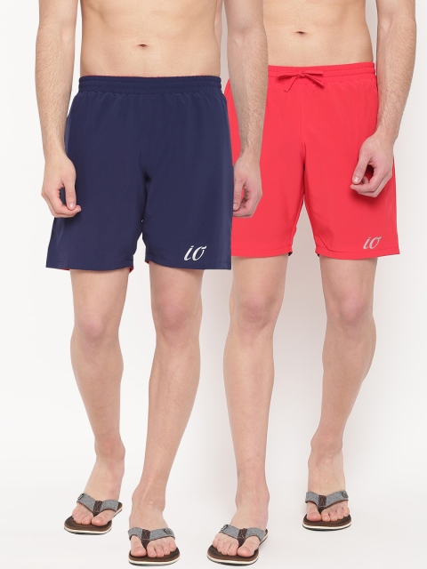 

iO Men Pack Of 2 Red & Navy Blue Solid Reversible Swim Shorts