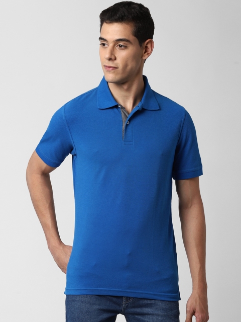 

Peter England Men Blue Solid Polo Collar T-shirt