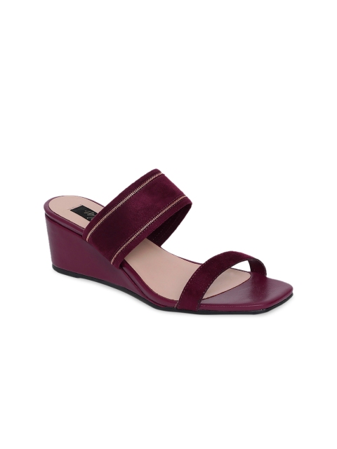 

Mode by Red Tape Women Burgundy Suede Solid Wedges