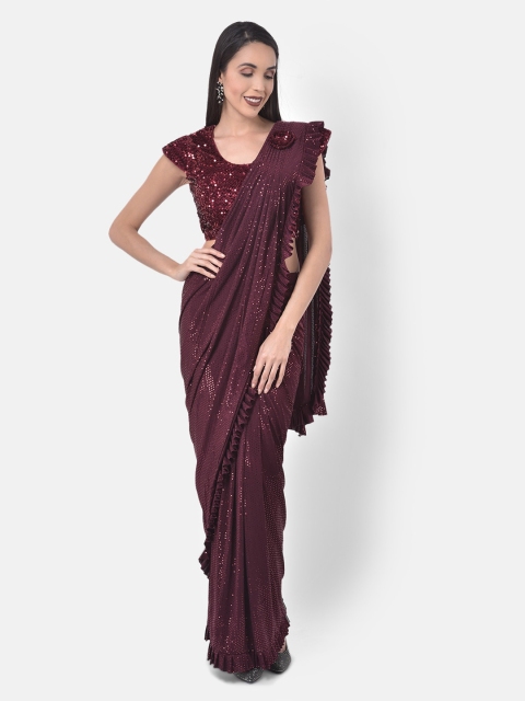 

Neerus Maroon Embellished Nylon Saree