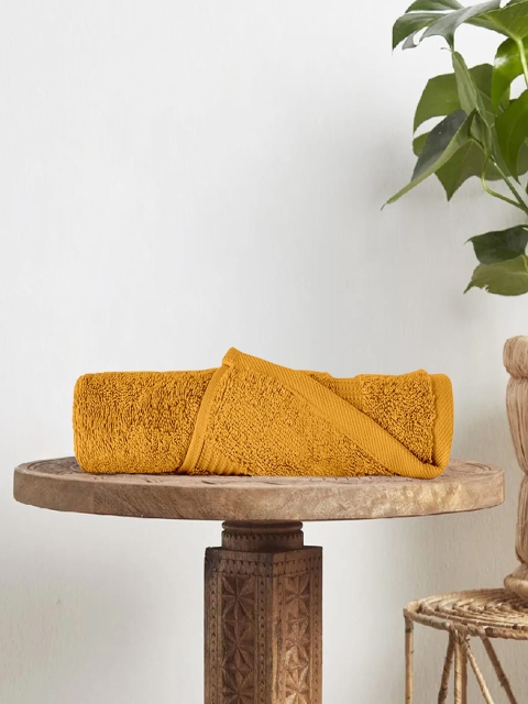 

Divine Casa Mustard Yellow Solid 500 GSM Solid Bath Towel