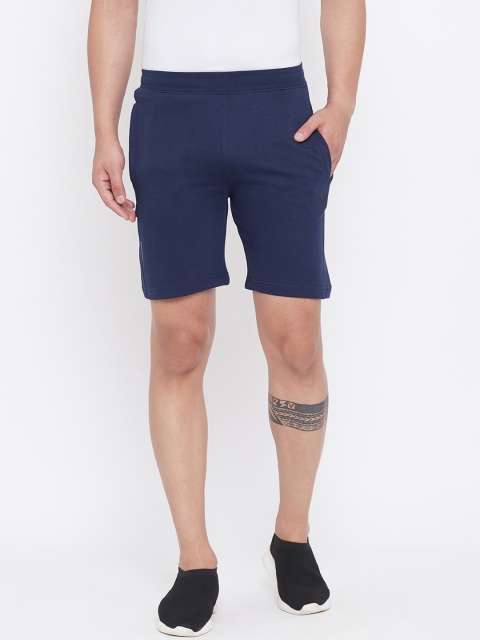 

Okane Men Navy Blue Solid Regular Fit Regular Shorts