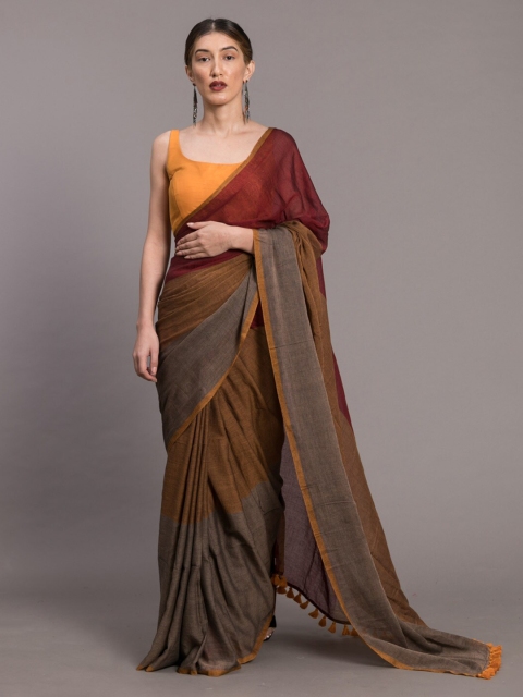 

Suta Brown Solid Saree