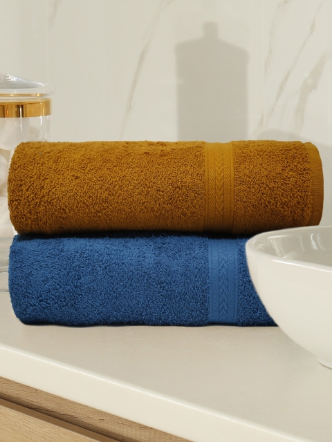 

Trident Unisex Rust Brown & Blue Set of 2 Solid 400 GSM Cotton Bath Towel