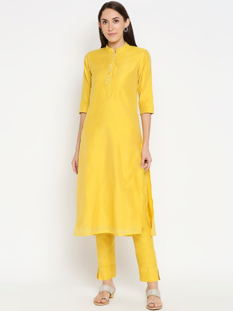 

Desi Weavess Women Yellow Solid Kurta with Trousers
