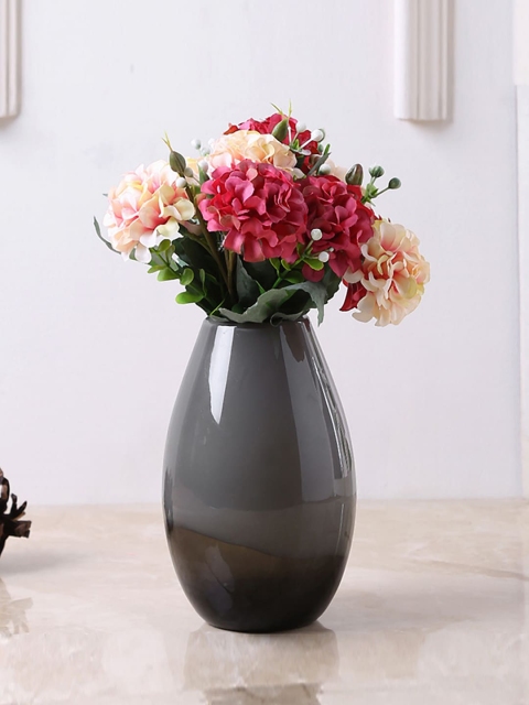 

Aapno Rajasthan Black & Brown Solid Glass Flower Vase