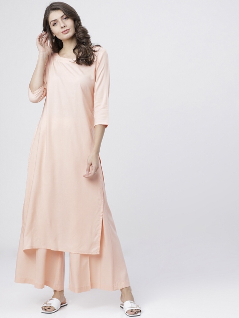 

Vishudh Women Peach-Coloured Solid Kurta with Palazzos