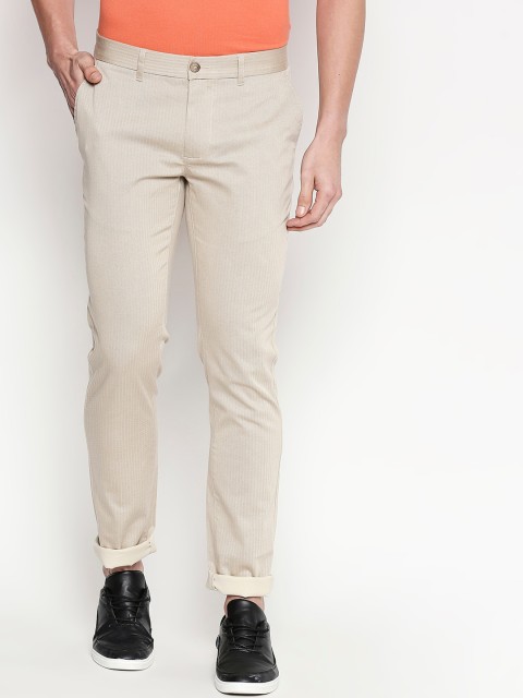

Basics Men Beige Tapered Fit Solid Regular Trousers