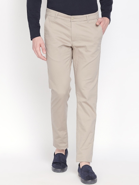 

Basics Men Beige Tapered Fit Solid Regular Trousers