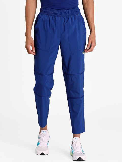 

Puma Men Blue Solid Train Vent Woven Track Pants