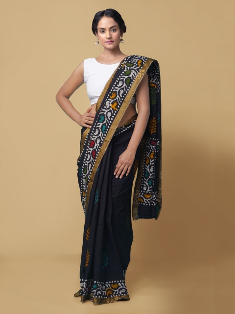 

Unnati Silks Black & Red Pure Cotton Batik Printed Patola Saree