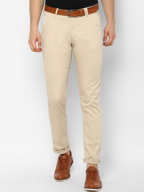

Solly Jeans Co. Men Beige Pure Cotton Slim Fit Solid Regular Trousers