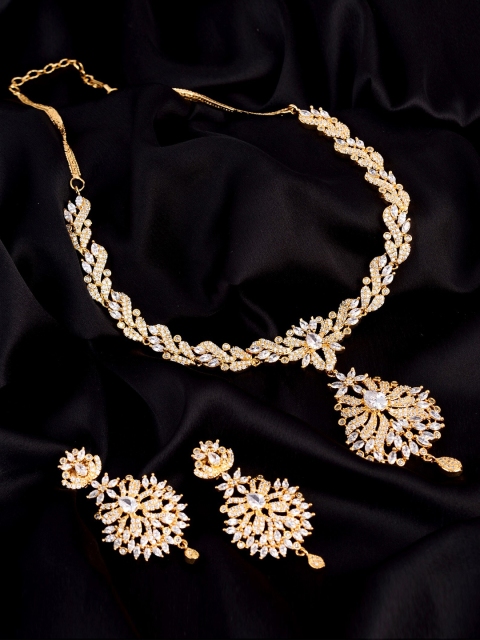 

Saraf RS Jewellery Gold-Plated American Diamond Studded Handcrafted Jewellery Set