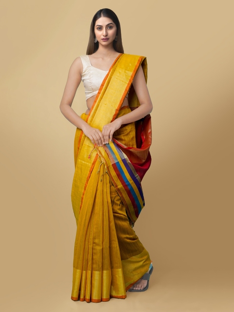 

Unnati Silks Yellow Silk Cotton Solid Kanjeevaram Saree