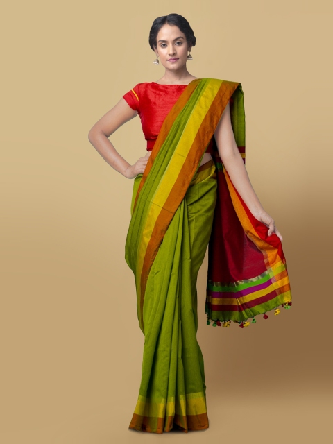 

Unnati Silks Green Silk Cotton Solid Kanjeevaram Saree