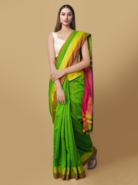 

Unnati Silks Green Silk Cotton Solid Kanjeevaram Saree