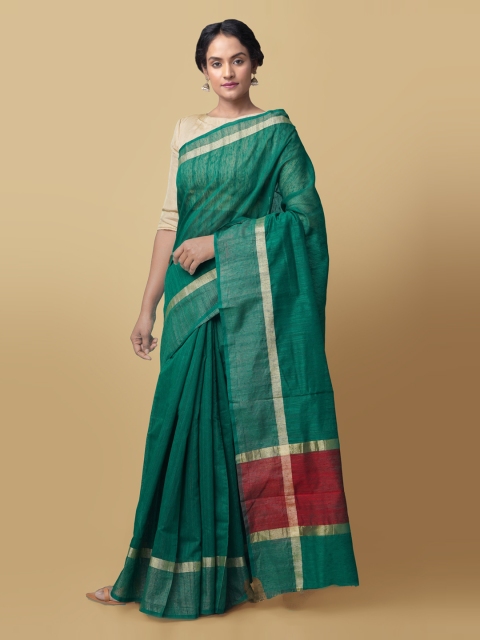 

Unnati Silks Green Art Silk Solid Baluchari Saree