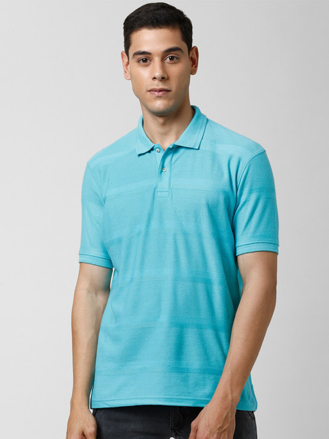 

Peter England Casuals Men Blue Self Design Polo Collar T-shirt