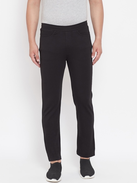 

Okane Men Black Solid Track Pants