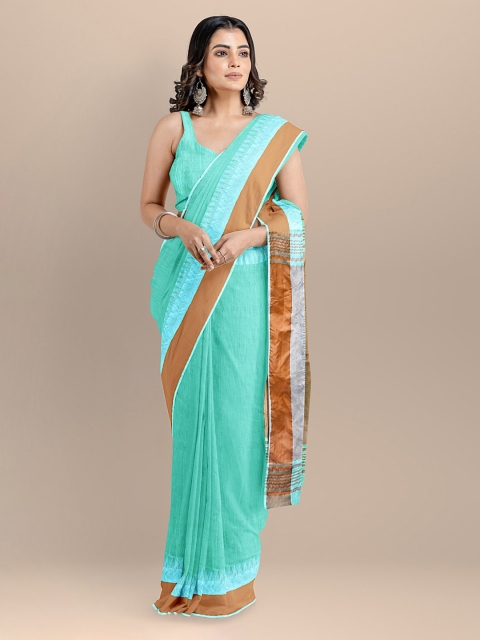 

BharatSthali Sea Green & Brown Silk Cotton Solid Maheshwari Saree