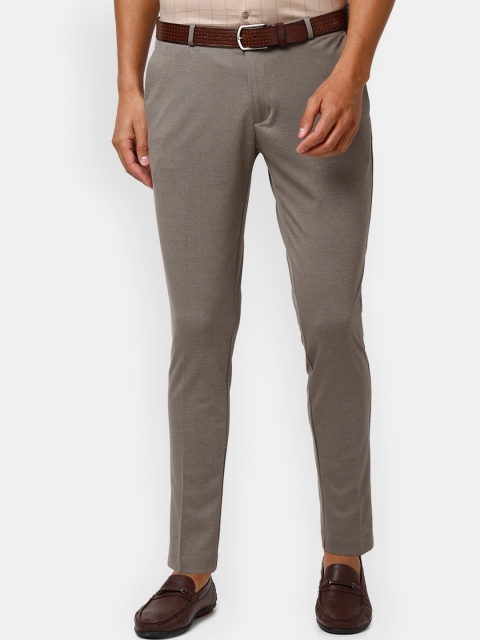 

Louis Philippe Sport Men Beige Slim Fit Self Design Regular Trousers