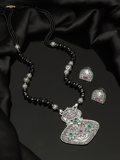 

aadita Oxidised Silver-Toned & Black Stone-Studded Tribal Mangalsutra With Earrings