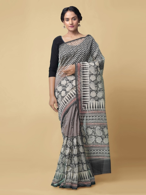 

Unnati Silks Grey Net Printed Patola Saree