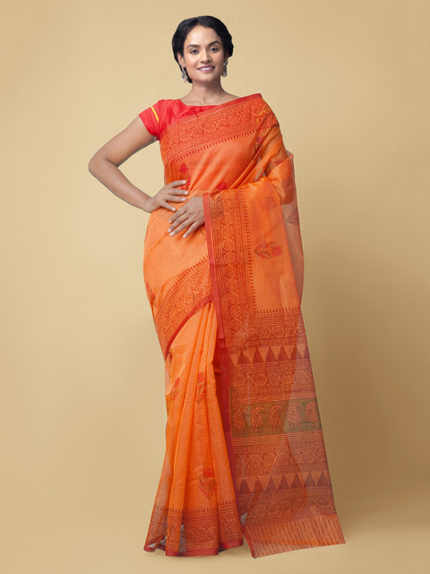 

Unnati Silks Orange Net Printed Patola Saree
