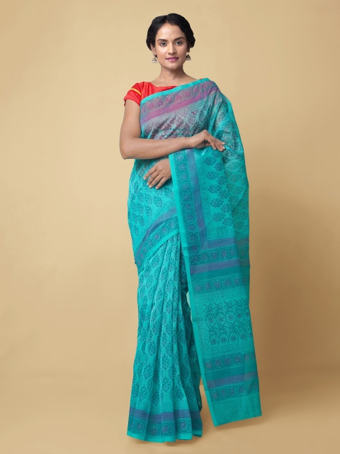 

Unnati Silks Blue Net Handloom Block Printed Saree