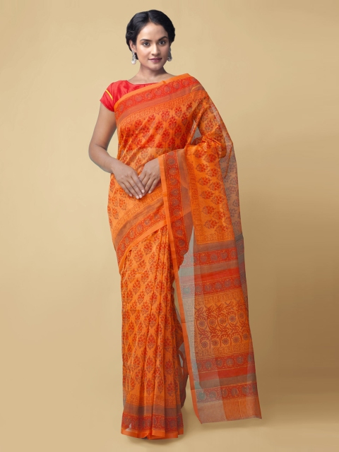 

Unnati Silks Orange Net Printed Patola Saree