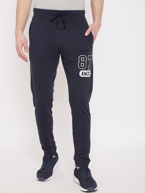 

Austin wood Men Navy Blue & White Solid Cotton Slim-Fit Joggers with Printed Detail