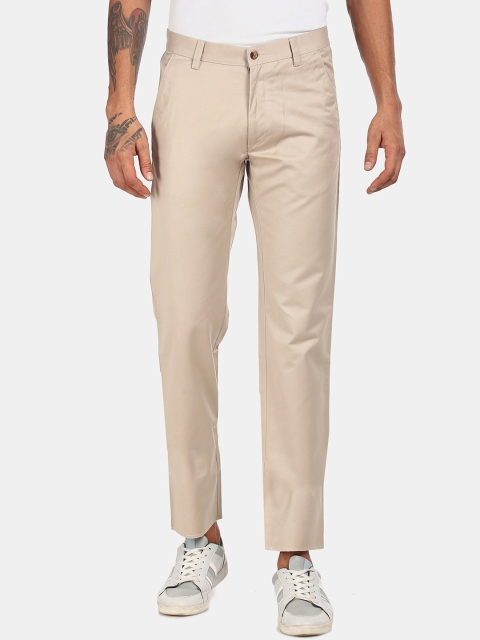 

Arrow Sport Men Beige Pure Cotton Regular Fit Solid Regular Trousers