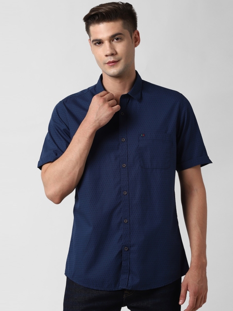 

Peter England Casuals Men Navy Blue Slim Fit Self Design Pure Cotton Casual Shirt