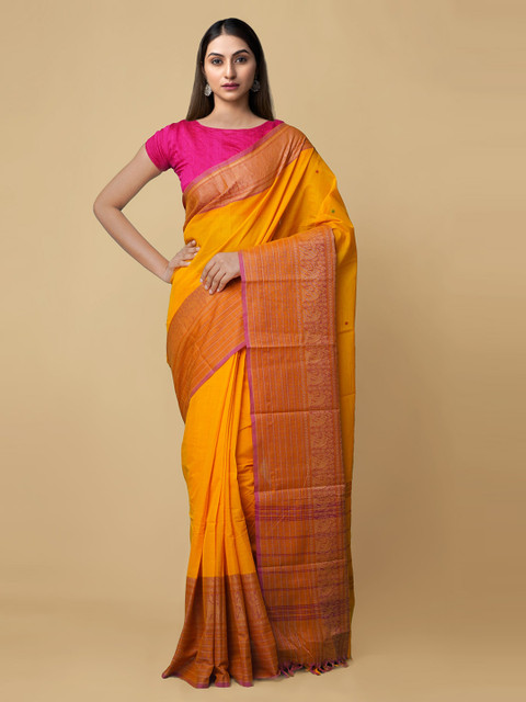 

Unnati Silks Orange Pure Cotton Solid Dabu Saree