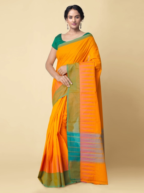 

Unnati Silks Orange Pure Cotton Solid Kanjeevaram Saree