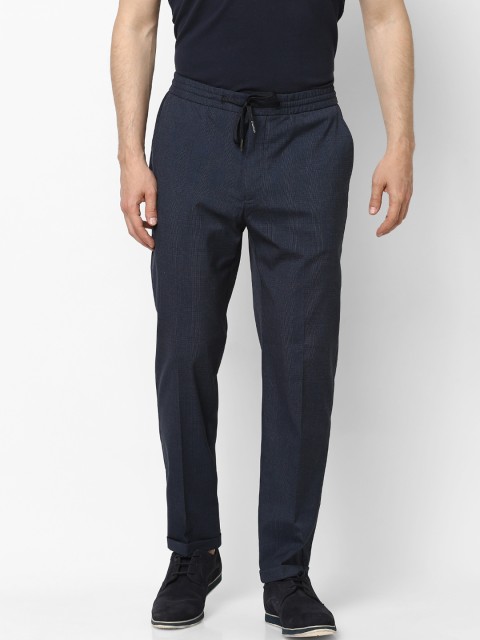 

Celio Men Navy Blue Slim Fit Self Design Regular Trousers