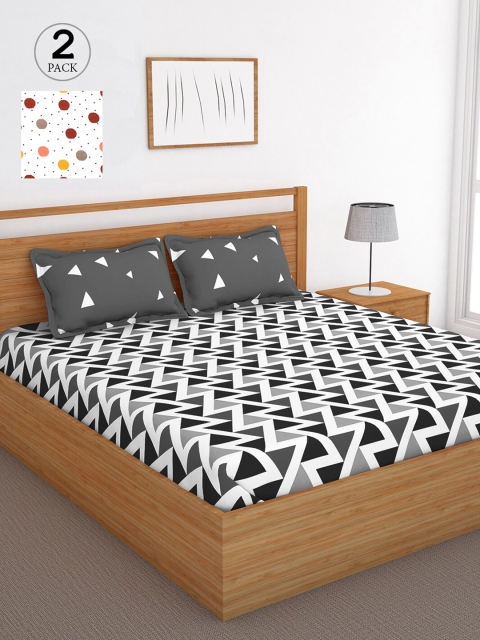 

Bedspun White & Orange Geometric 120 TC Cotton 2 Queen Bedsheet with 4 Pillow Covers
