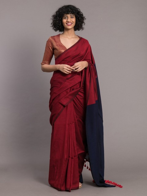 

Suta Red Solid Cotton Blend Saree