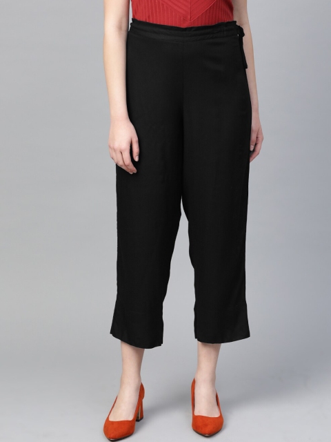 

KSUT Women Black Regular Fit Solid Regular Trousers