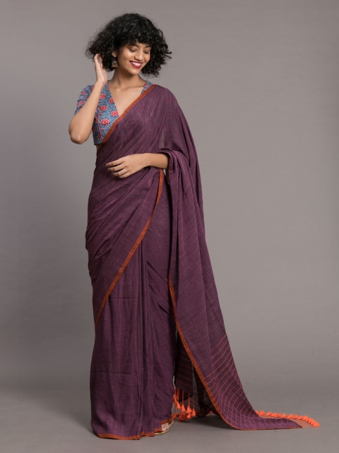 

Suta Purple & Orange Cotton Blend Solid Saree