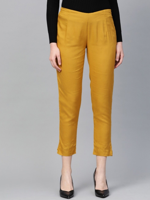 

KSUT Women Mustard Regular Fit Solid Regular Trousers
