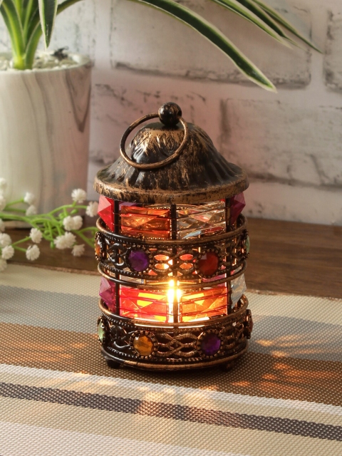 

Aapno Rajasthan Copper-Toned & Red Embellished Tea Light Candle Holder