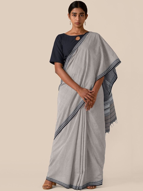 

Taneira Grey Solid Pure Cotton Saree